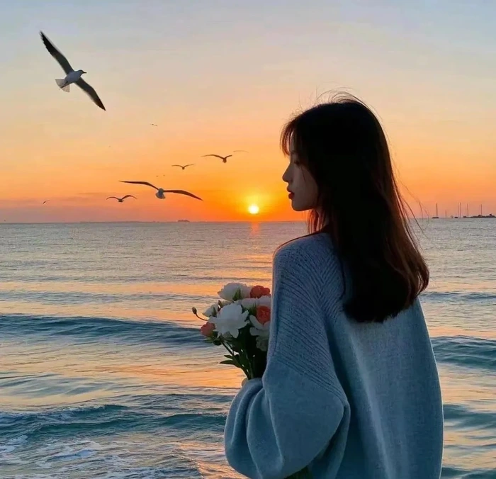 gái cầm hoa cực đẹp