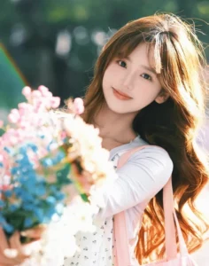 hình ảnh gái đẹp cầm hoa